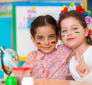 Two happy girls in international summer camp